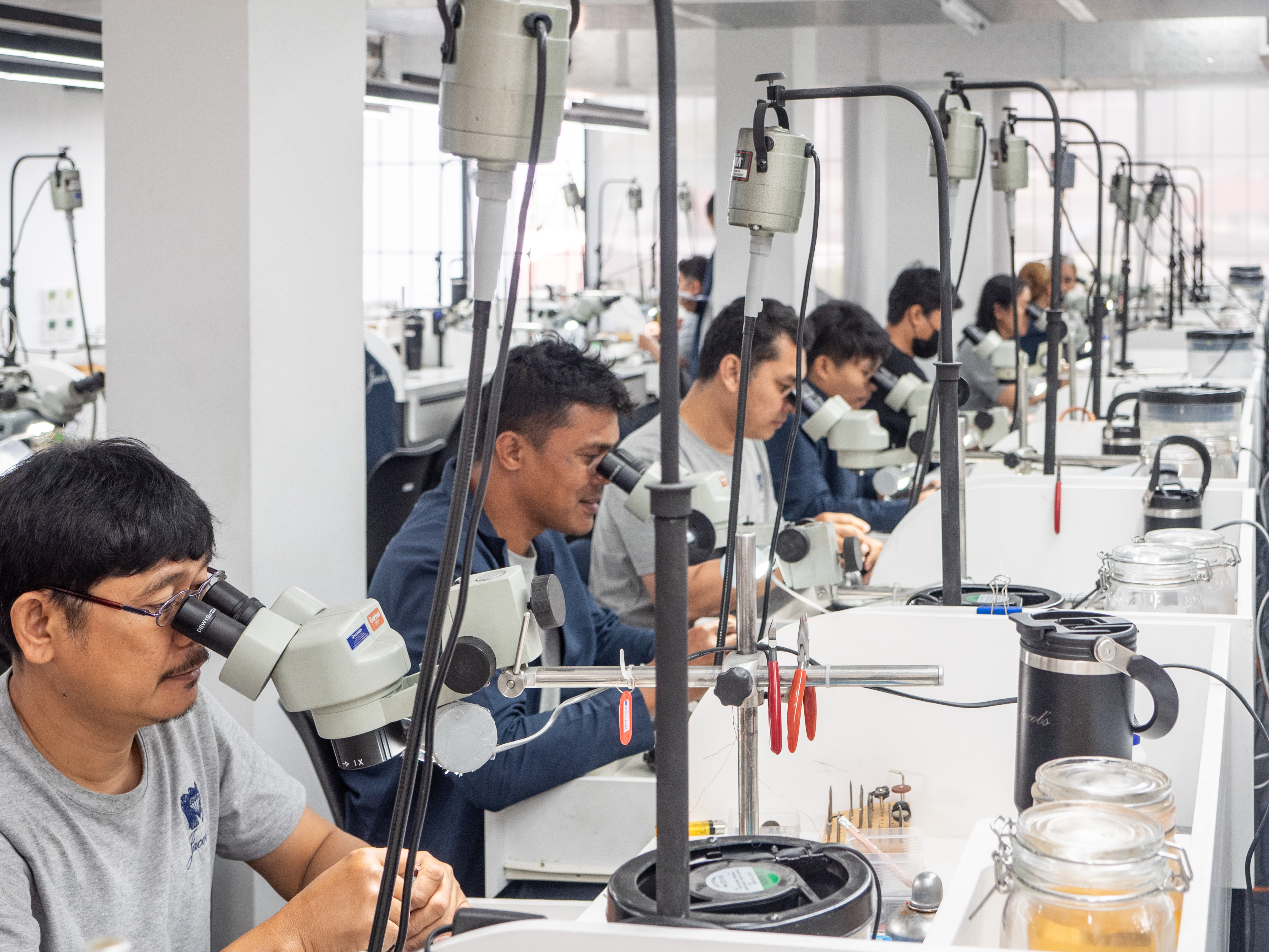 Setters working under microscope